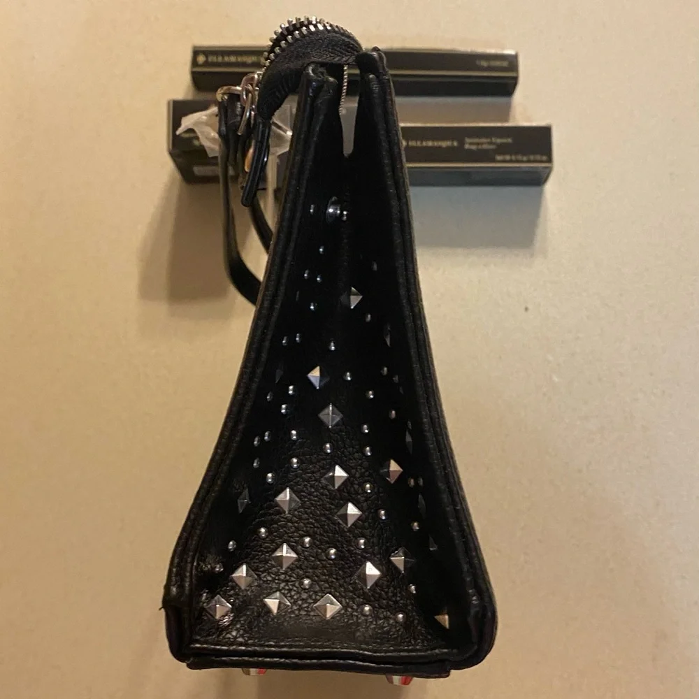 Illamasqua Limited Edition Reign of Rock studded makeup bag with products! 💄💋